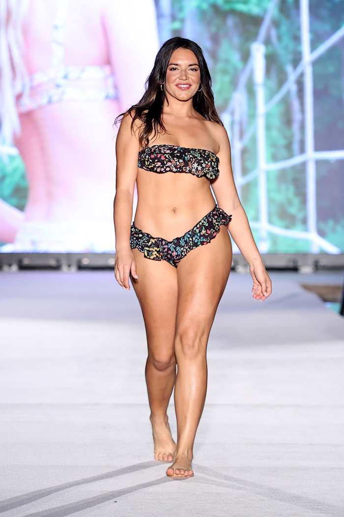 Mady Dewey walks the runway for Sports Illustrated Swimsuit Runway Show During Paraiso Miami Beach on July 16, 2022 in Miami Beach, Florida.
